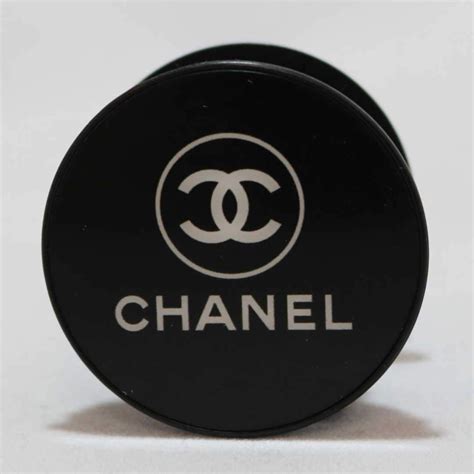 chanel pop socket plugs.